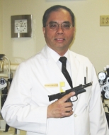 Dr Wong with Service Pistol
