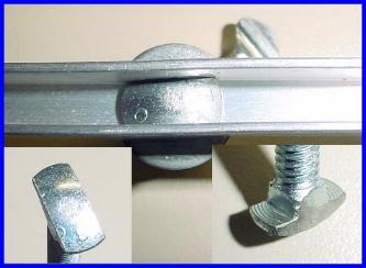 Carriage bolt showing the two cuts and how it fits into the channel - click for larger image